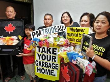 TAKE THEM OUT:  Environmental justice advocates appeal anew to visiting Prime Minister Justin Trudeau to resolve the long-drawn-out dumping controversy by returning the Canadian garbage to its origin, and rectifying the environmental injustice inflicted against the Filipino nation and people.