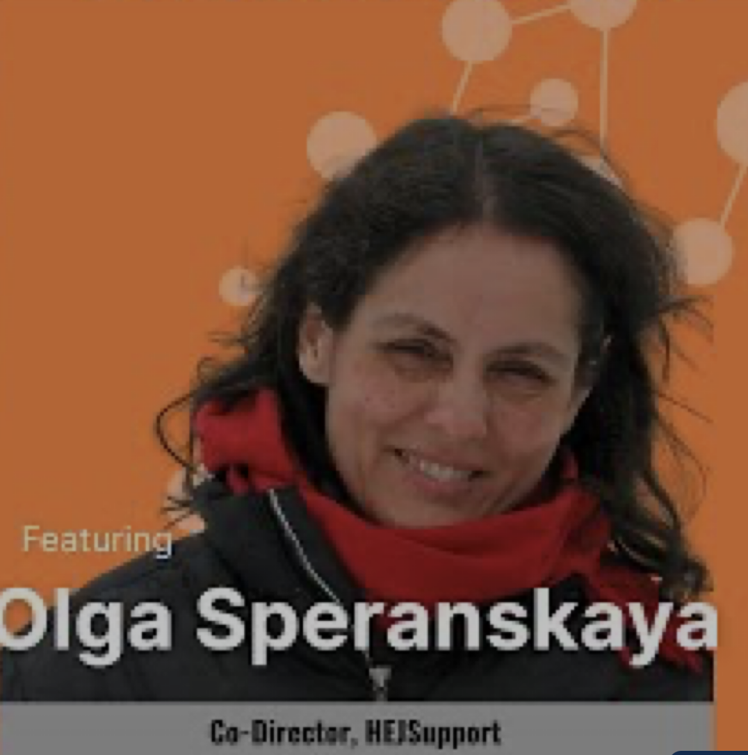 A woman with long, dark hair wearing a red scarf and black jacket smiles in front of an orange background with the text: Featuring Olga Speranskaya, Co-Director, HEJSupport.