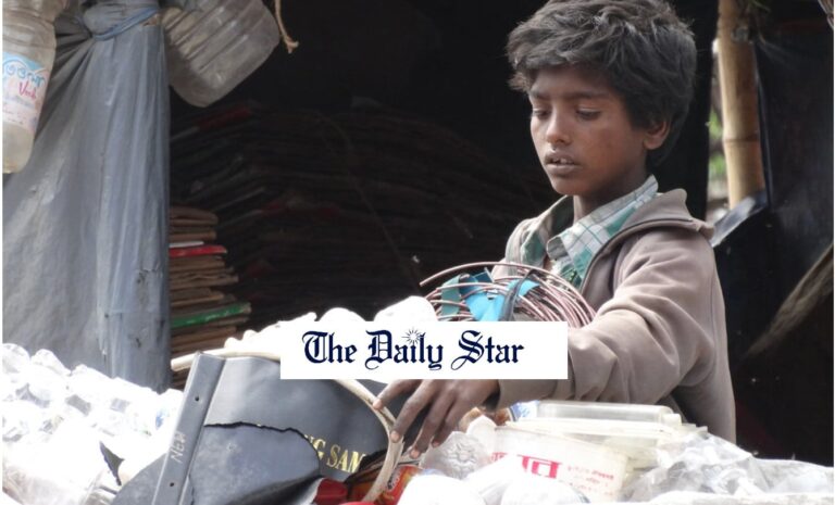 A boy sorts through a pile of discarded plastic bottles and other recyclables in an outdoor setting. The Daily Star logo is overlaid on the image, partially covering his hands and the objects.