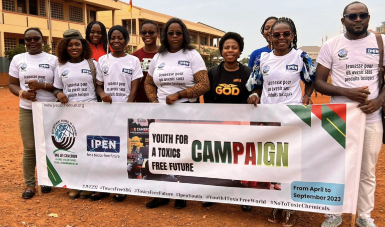 IPEN youth from the Francophone Africa region holding a youth campaign banner
