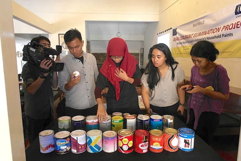 IPEN members in Indonesia showing lead paint buckets